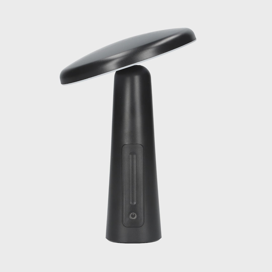 360 Grad Ansicht einer kabellosen LED Tischleuchte in Schwarz.